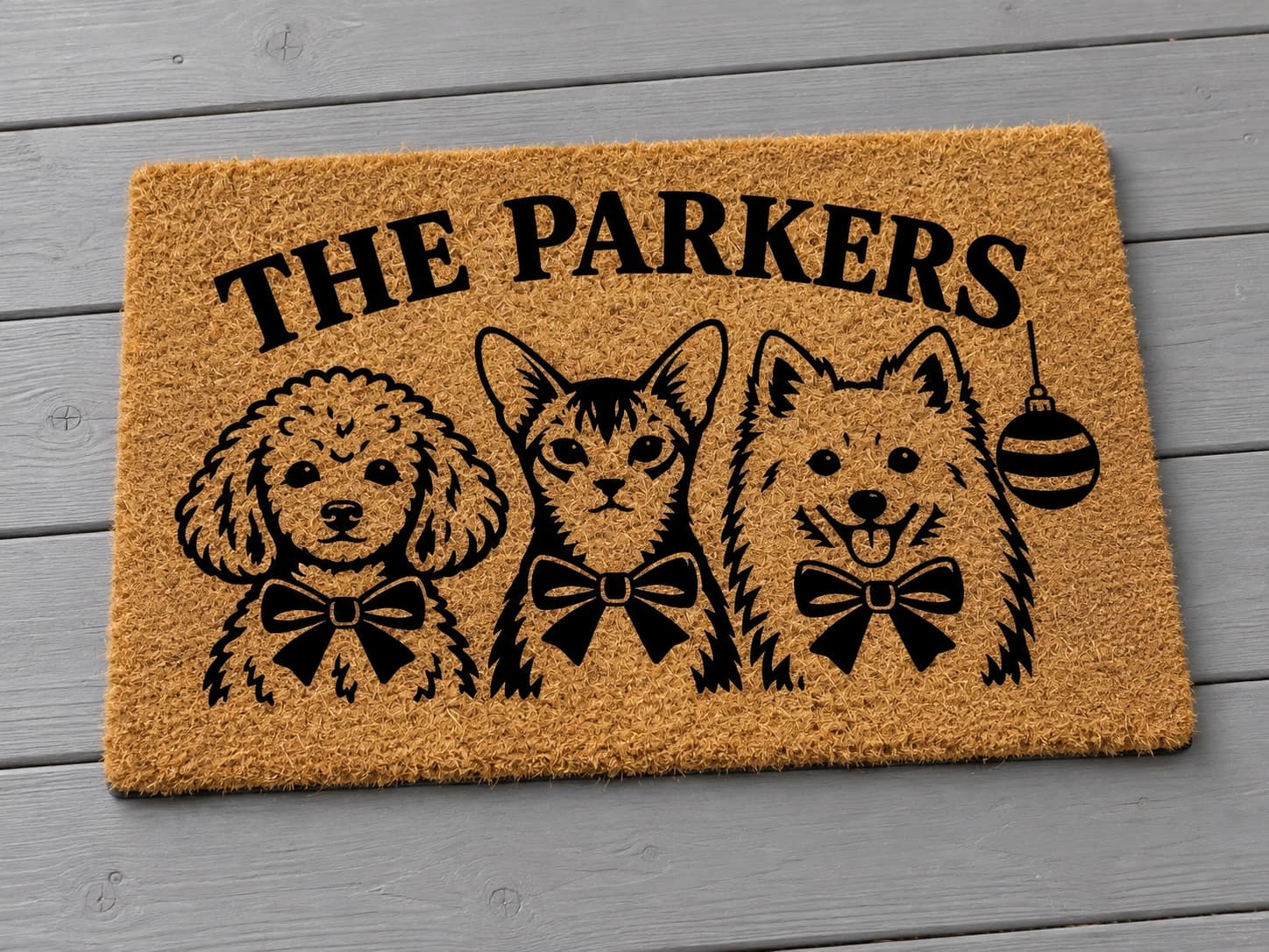 Christmas Family coir mat photographed in a studio