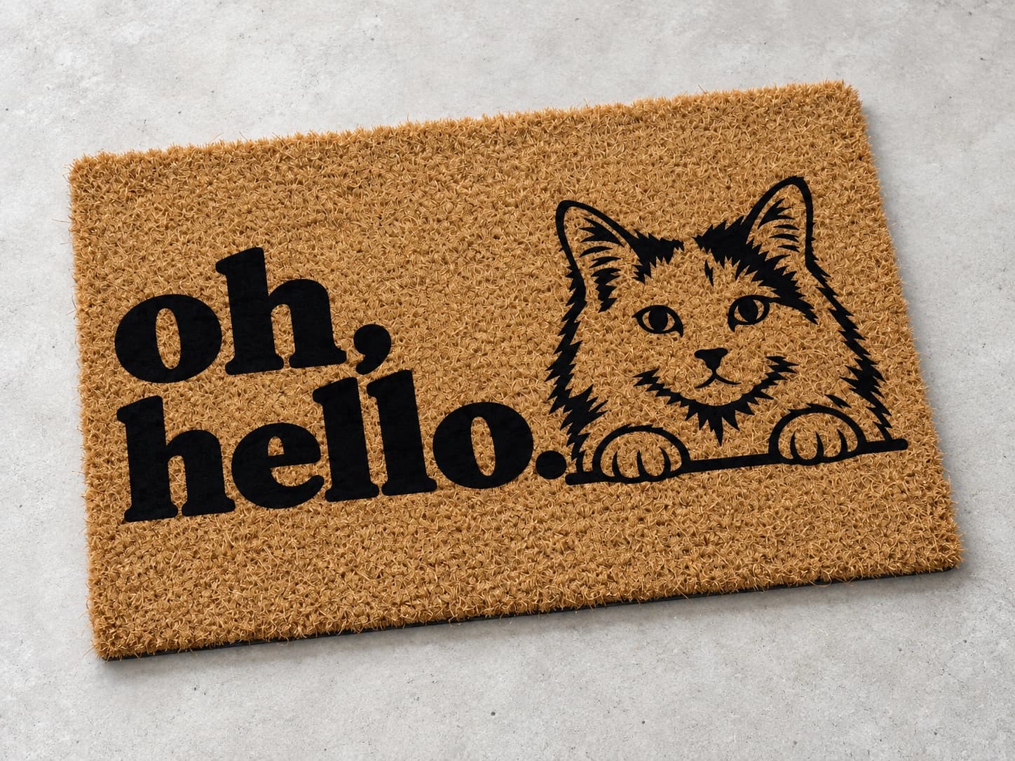 Oh Hello coir mat photographed in a studio